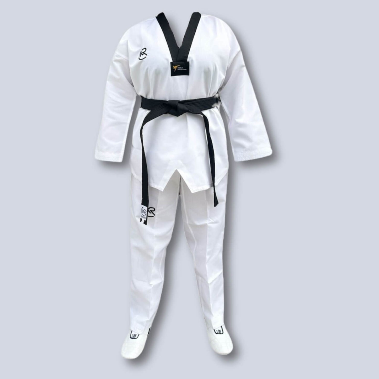 White martial arts uniform with white belt on a light gray background