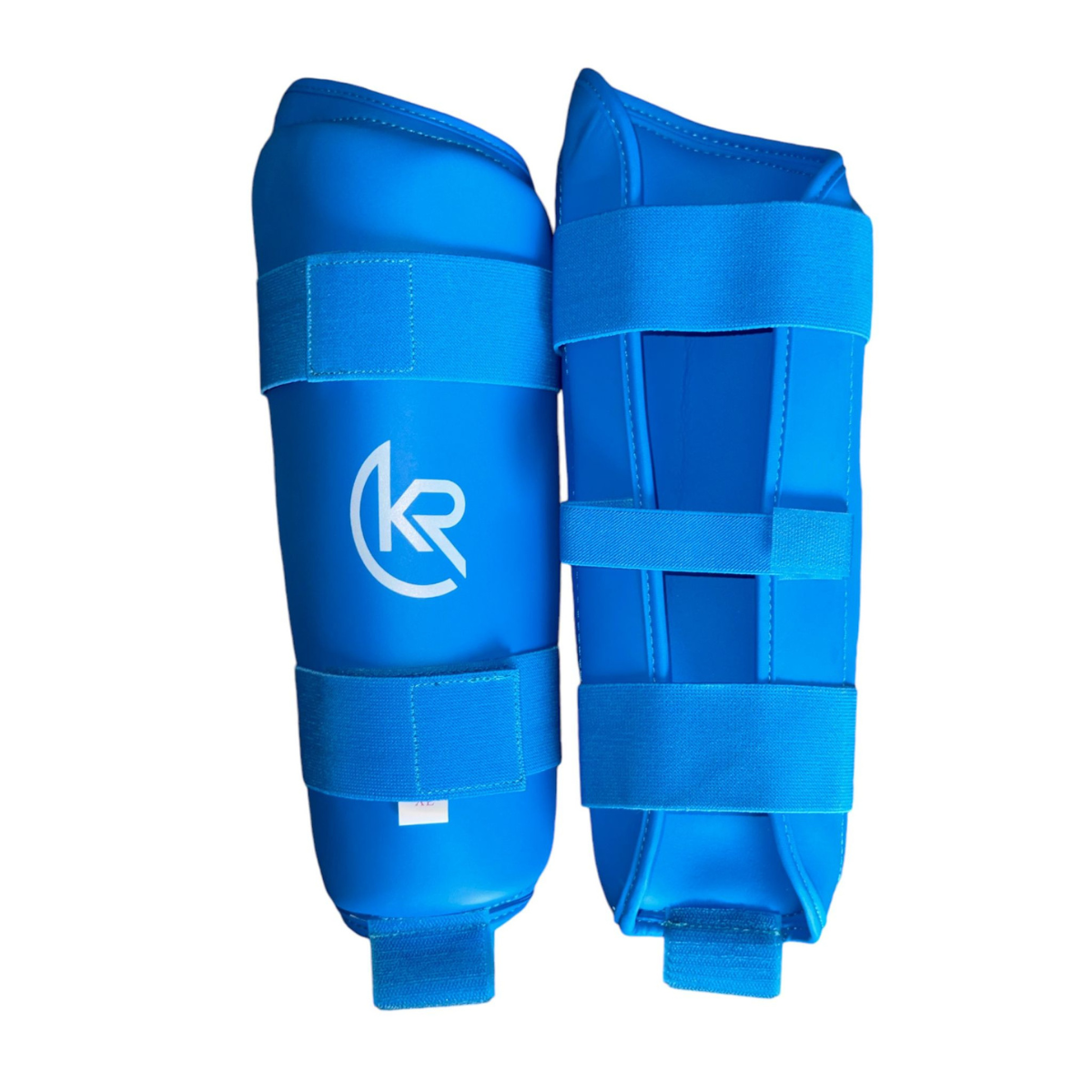 Karate athlete wearing Krolin SHINDEFENSE shin and instep guards – secure fit and high-impact absorption for sparring.