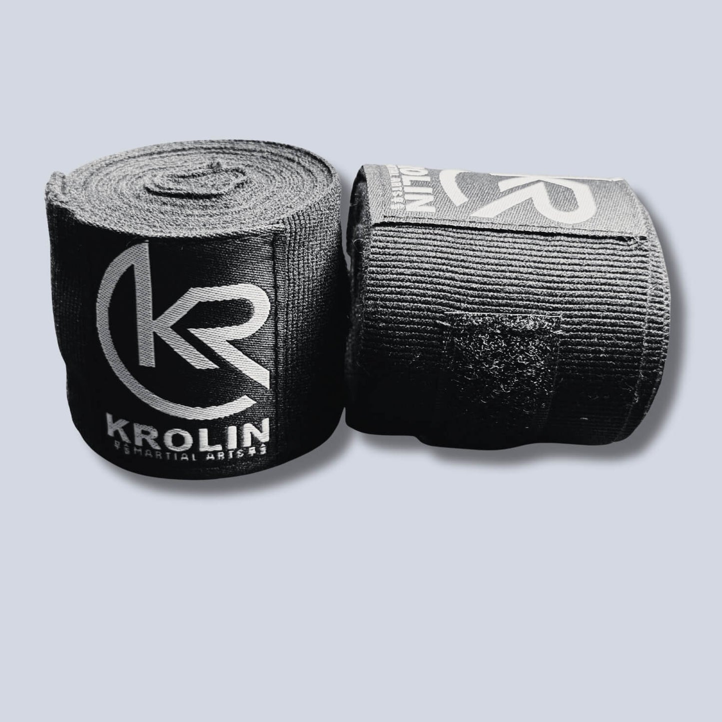 Krolin StrikeWrap 3m black boxing hand wraps rolled.