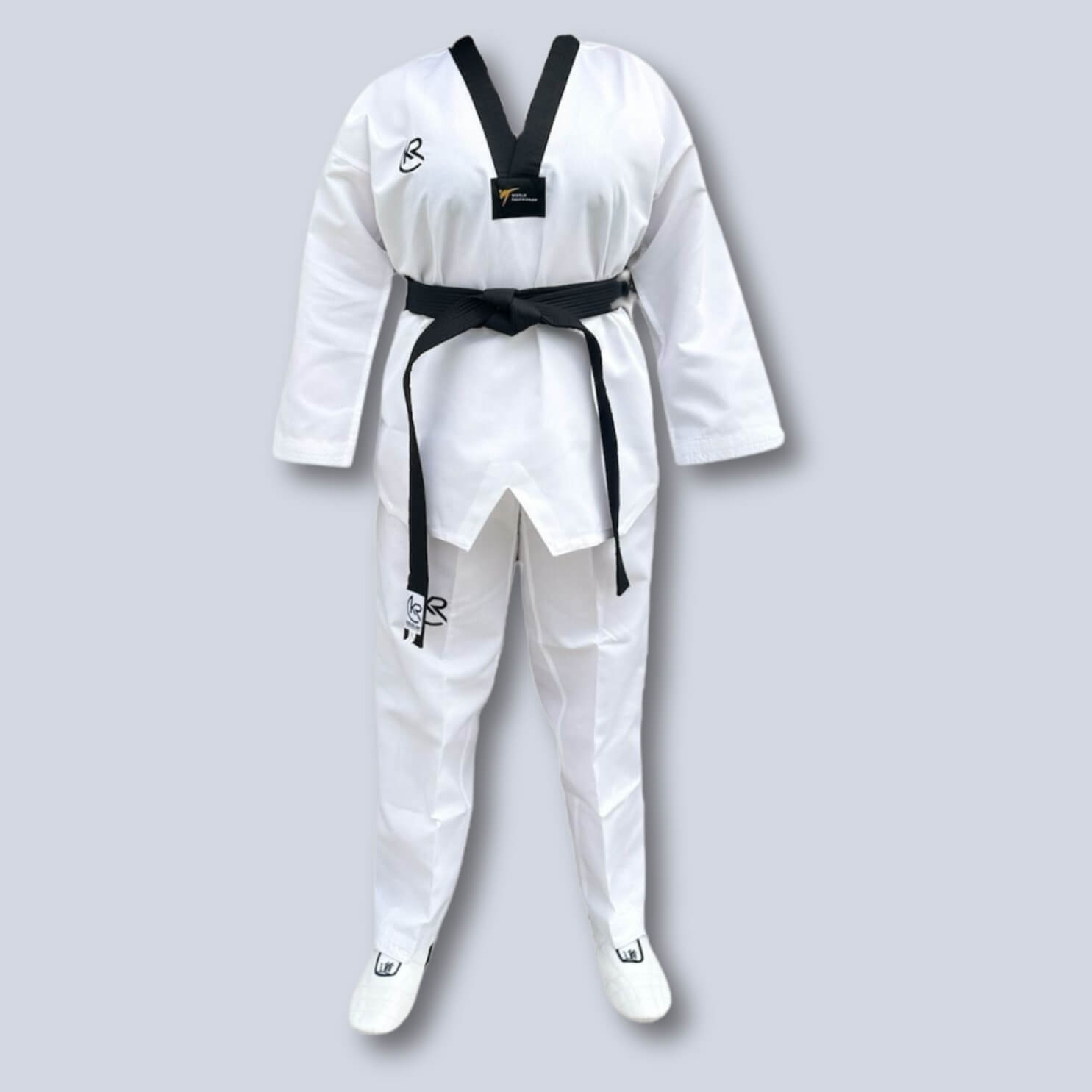 White martial arts uniform with white belt on a light gray background