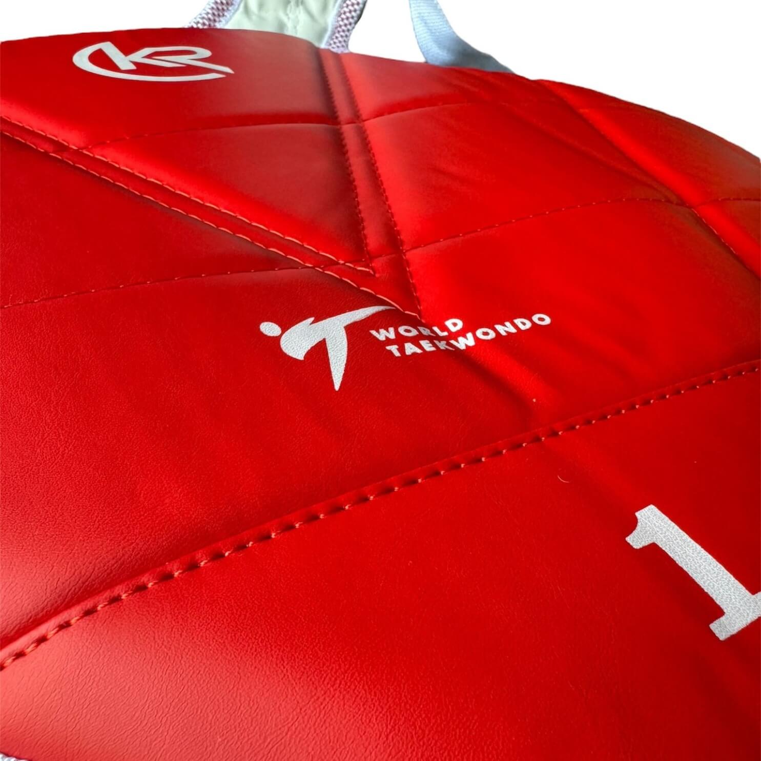 Close-up of Krolin SHIELD-PRO body protector – padded martial arts chest gear with secure tie straps and reinforced stitching.