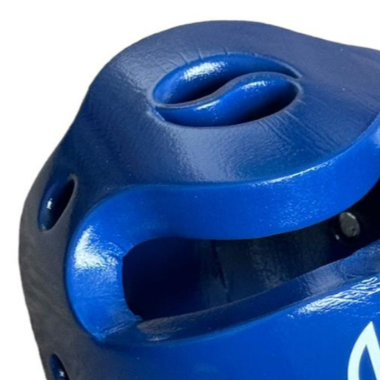 Close-up of Krolin HEADSHIELD helmet – soft foam padding and secure chin strap for safe and comfortable martial arts training.