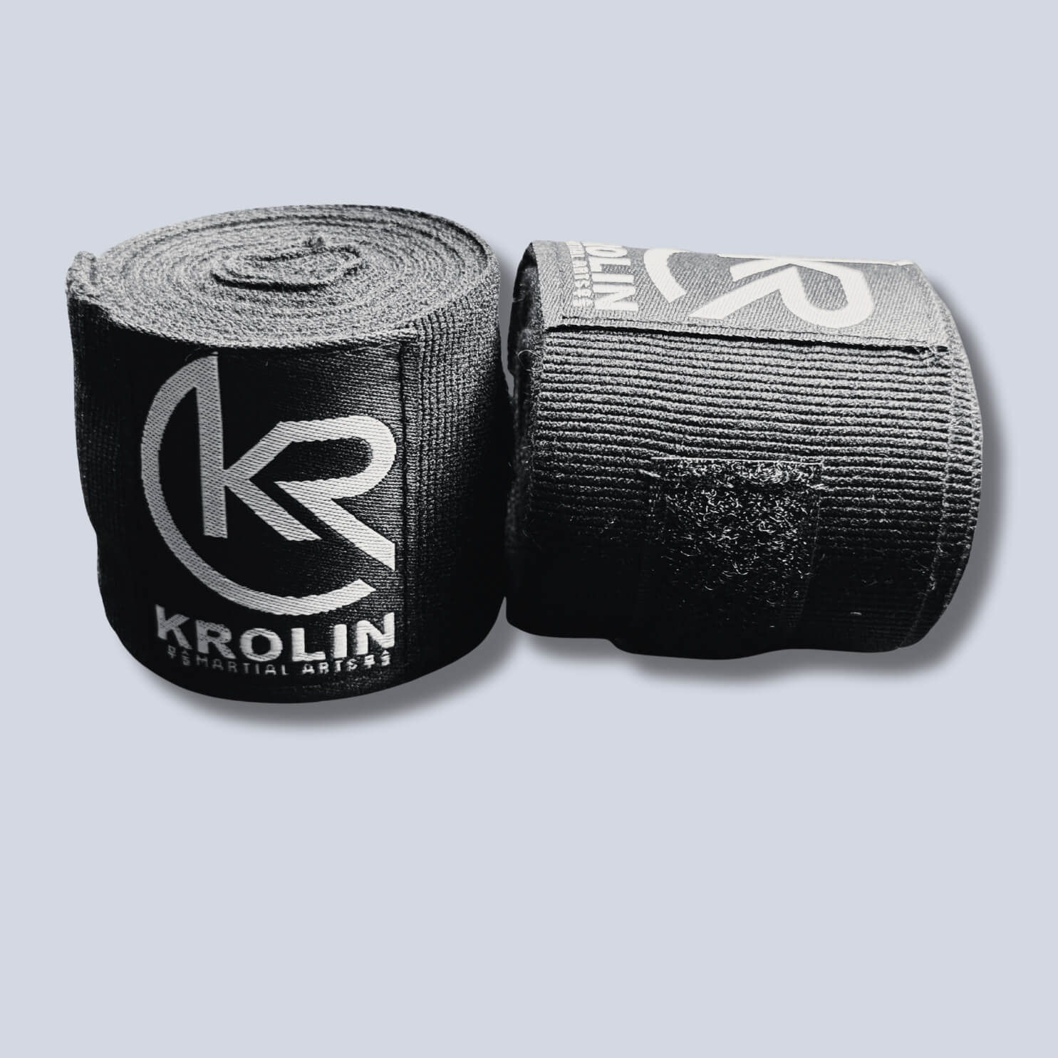 Krolin StrikeWrap 3m black boxing hand wraps rolled.
