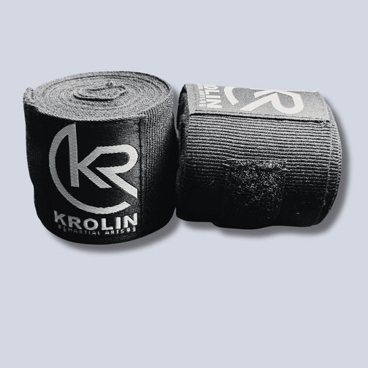 Krolin StrikeWrap 3m black boxing hand wraps rolled.